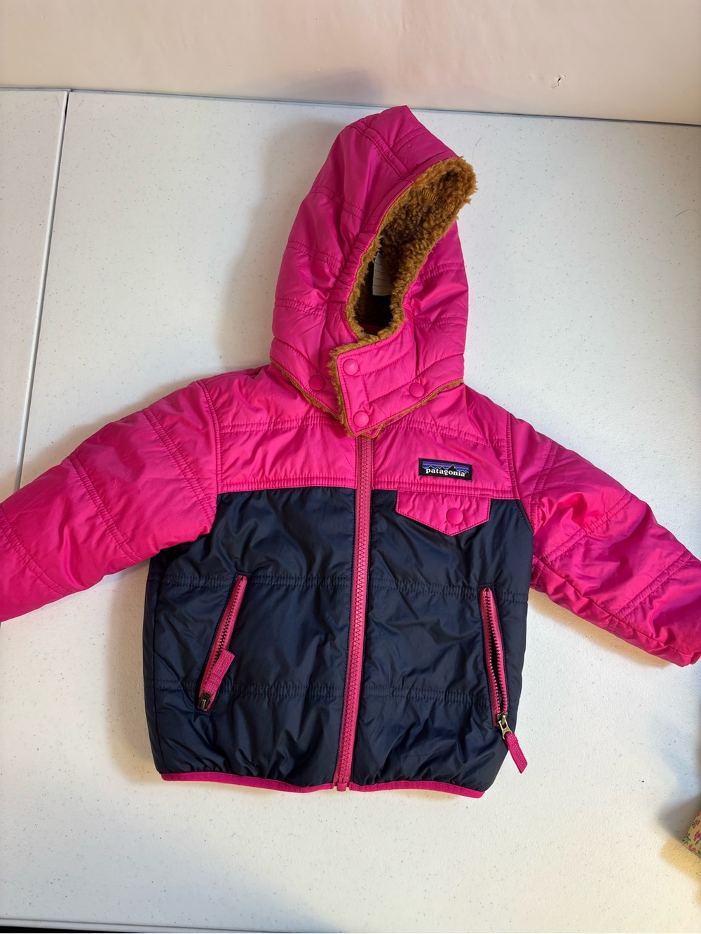 Patagonia Baby Reversible Tribbles Hoody bright pink and navy size 12-18 months